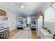 Bright bedroom featuring twin bunk beds, overhead fan, hardwood floors, and whimsical basketball decor at 2 Piedmont Ave # 1/2, Charleston, SC 29403