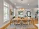 Elegant dining room featuring natural light, stylish decor, and an inviting atmosphere at 2 Piedmont Ave # A, Charleston, SC 29403