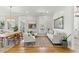 Comfortable living room with light-filled windows and stylish, neutral decor at 2 Piedmont Ave # A, Charleston, SC 29403