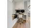 A dedicated office space with built-in desk and storage cabinets, ideal for working from home at 2 Piedmont Ave # 1/2, Charleston, SC 29403