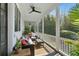 Relaxing screened porch with comfortable seating and serene outdoor views at 2 Piedmont Ave # A, Charleston, SC 29403