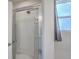 Modern shower with glass door and window at 215 Shortmarsh St, Summerville, SC 29486