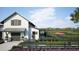 Charming white barn with dark accents and beautiful landscaping at 216 Yalton St, Summerville, SC 29486