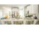 Stylish eat-in kitchen with granite countertops, stainless steel appliances, and modern white cabinets at 216 Yalton St, Summerville, SC 29486
