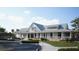 Exterior view of the community clubhouse, featuring modern architectural design and well-maintained landscaping at 219 Yalton St, Summerville, SC 29486