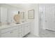 Elegant bathroom with double sinks, marble floors and a glass-enclosed shower at 220 Callibluff Dr, Summerville, SC 29486