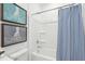 Bright bathroom features a shower and tub combination with framed wall art at 220 Callibluff Dr, Summerville, SC 29486