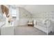Serene Bedroom with stylish wallpaper, comfortable furnishings, and natural light at 220 Callibluff Dr, Summerville, SC 29486
