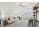 Upstairs bonus room offers a versatile space with modern lighting and stylish decor at 220 Callibluff Dr, Summerville, SC 29486
