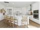 Open concept kitchen with an island, stainless steel appliances, and bar stool seating at 220 Callibluff Dr, Summerville, SC 29486