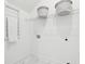 Bright laundry room features storage shelves, towel rack, and washer/dryer hookups at 220 Callibluff Dr, Summerville, SC 29486