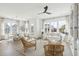 Open living room featuring ample windows, modern décor, and hardwood floors at 220 Callibluff Dr, Summerville, SC 29486