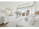 Serene main bedroom with large windows, stylish decor and hardwood floors at 220 Callibluff Dr, Summerville, SC 29486