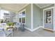 Inviting porch with comfortable seating and a charming exterior view at 220 Callibluff Dr, Summerville, SC 29486
