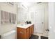 Bathroom with wood vanity, soft lighting, and neutral wall paint at 224 Jackson St, Goose Creek, SC 29445