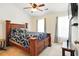 Bedroom featuring a rustic wooden bed frame and a ceiling fan at 224 Jackson St, Goose Creek, SC 29445