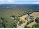 Expansive aerial view of wooded acreage featuring homesites offering privacy and beautiful natural surroundings at 225 Ridge Rd, Ridgeville, SC 29472