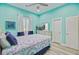 Light and airy bedroom featuring stylish decor, neutral tones, and a comfortable queen size bed at 225 Ridge Rd, Ridgeville, SC 29472