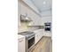 Contemporary kitchen design with stainless steel range and built-in double ovens at 225 Ridge Rd, Ridgeville, SC 29472