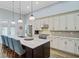 Bright kitchen with a large island, stainless steel appliances, and pendant lighting at 225 Ridge Rd, Ridgeville, SC 29472