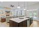 Open-concept kitchen and living room with a kitchen island at 225 Ridge Rd, Ridgeville, SC 29472