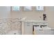Functional laundry room featuring a dog wash station, folding table and front-loading washer and dryer at 225 Ridge Rd, Ridgeville, SC 29472