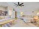 Spacious bonus living room with vaulted ceilings, fan, and comfortable seating at 225 Ridge Rd, Ridgeville, SC 29472