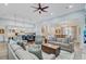 Spacious open-concept living room connected to the kitchen and dining area, perfect for entertaining at 225 Ridge Rd, Ridgeville, SC 29472