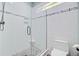 Modern shower with white subway tile, mosaic accents, and a glass door at 225 Ridge Rd, Ridgeville, SC 29472