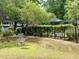 A view of the backyard featuring disc golf basket and fence at 2314 Treescape Dr # 2406, Charleston, SC 29414