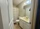 Bright bathroom featuring a shower and vanity with a beige sink at 2314 Treescape Dr # 2406, Charleston, SC 29414