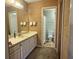 Bathroom with natural accents, built in cabinet, and a full tub/shower at 2314 Treescape Dr # 2406, Charleston, SC 29414
