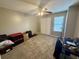 Bedroom featuring neutral carpet, a ceiling fan, and a double door closet at 2314 Treescape Dr # 2406, Charleston, SC 29414
