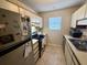Efficient kitchen with stainless steel appliances and bright natural light at 2314 Treescape Dr # 2406, Charleston, SC 29414