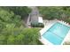 Aerial view of the pool with sunbathing deck, chairs, and umbrellas at 2314 Treescape Dr # 2406, Charleston, SC 29414