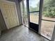 A view of the screened in porch with tiled floors and a yard view at 2314 Treescape Dr # 2406, Charleston, SC 29414