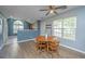 Cozy dining area featuring a round wooden table set and natural light from the window at 247 Darcy Ave, Goose Creek, SC 29445