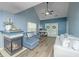 Spacious living room with vaulted ceilings, a fireplace, and lots of seating at 247 Darcy Ave, Goose Creek, SC 29445