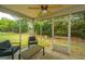Relaxing screened porch with outdoor seating and views of the landscaped yard, perfect for enjoying nature at 247 Darcy Ave, Goose Creek, SC 29445