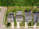 Birds eye view of backyard home exteriors displaying roof lines and privacy fencing at 259 Weeping Cypress Dr, Moncks Corner, SC 29461