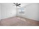Bright bedroom with neutral carpet, closet, and shiplap wall providing a cozy retreat at 259 Weeping Cypress Dr, Moncks Corner, SC 29461