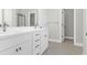 Well-lit bathroom featuring a double sink vanity and modern fixtures at 2909 Swamp Sparrow Cir, Johns Island, SC 29455