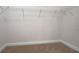 Walk in closet with shelving on a neutral carpet, maximizing organization at 2909 Swamp Sparrow Cir, Johns Island, SC 29455