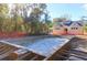 New pool under construction with surrounding wood framing, offering a blank canvas for future enjoyment at 2909 Swamp Sparrow Cir, Johns Island, SC 29455