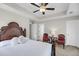 Cozy bedroom with decorative pillows on the bed, a ceiling fan, and comfortable seating area at 2919 Zachary George Ln, Johns Island, SC 29455