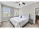 Bedroom with a neutral color scheme, carpet, ceiling fan, and natural light from two windows at 2919 Zachary George Ln, Johns Island, SC 29455