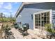 Charming outdoor deck featuring stylish seating arrangements with a view of the surrounding landscape at 2919 Zachary George Ln, Johns Island, SC 29455