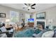 Well-appointed living room with a fireplace, classic decor, and ample seating at 2919 Zachary George Ln, Johns Island, SC 29455