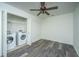 Bright laundry area with modern washer and dryer and wood-look floors at 2954 Woodland Park Dr, Mount Pleasant, SC 29466