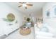 Inviting living room featuring neutral tones, stylish furniture, decorative mirror, and hardwood floors at 2954 Woodland Park Dr, Mount Pleasant, SC 29466